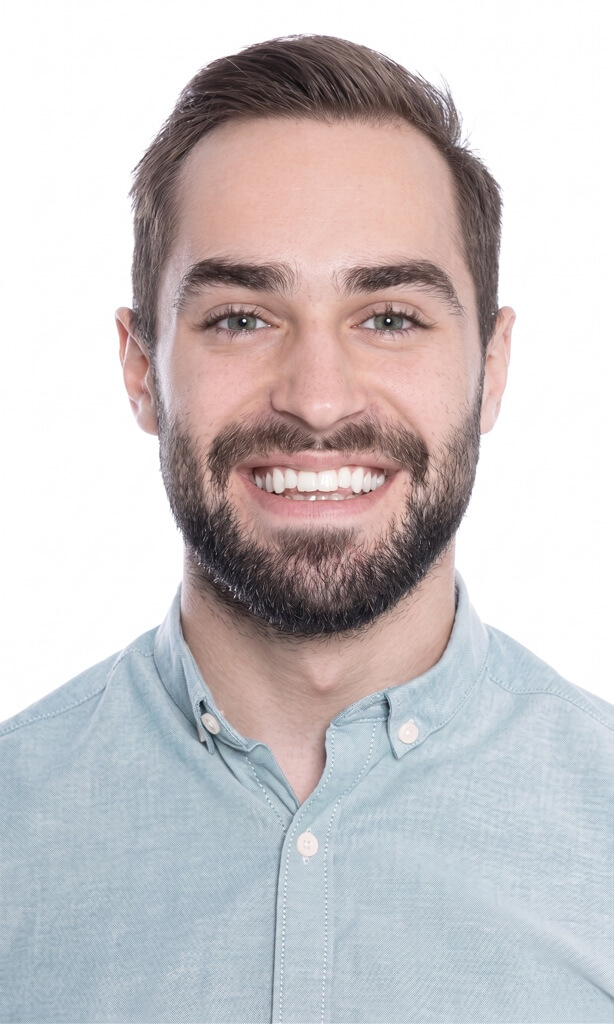 Relaxed, smiling young man with a beard