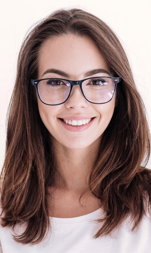 Smiling young woman with glasses