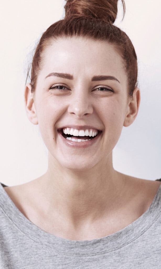 Laughing woman with bright white teeth