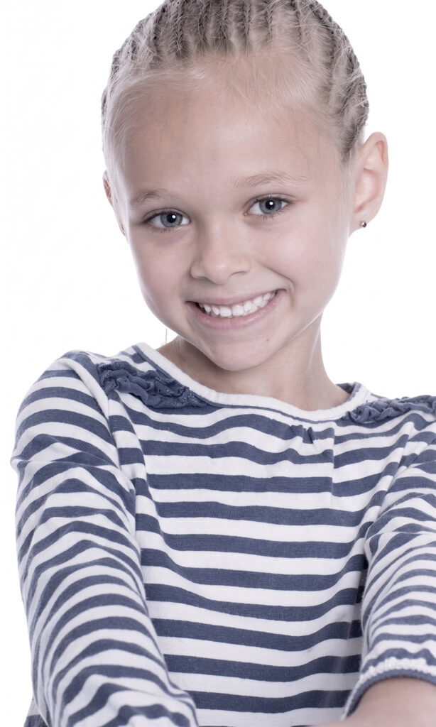 Smiling girl with braided hair